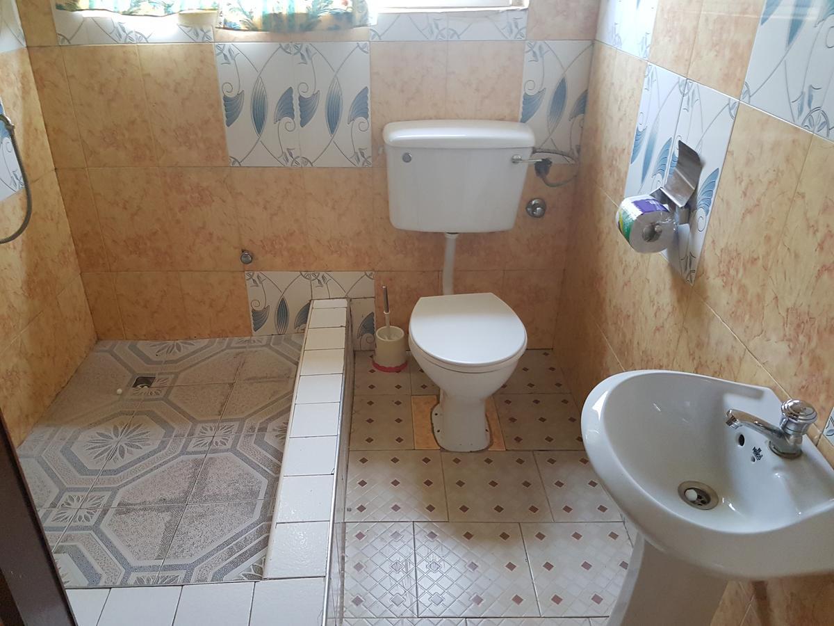 Open Space Hotel Кумаси Екстериор снимка