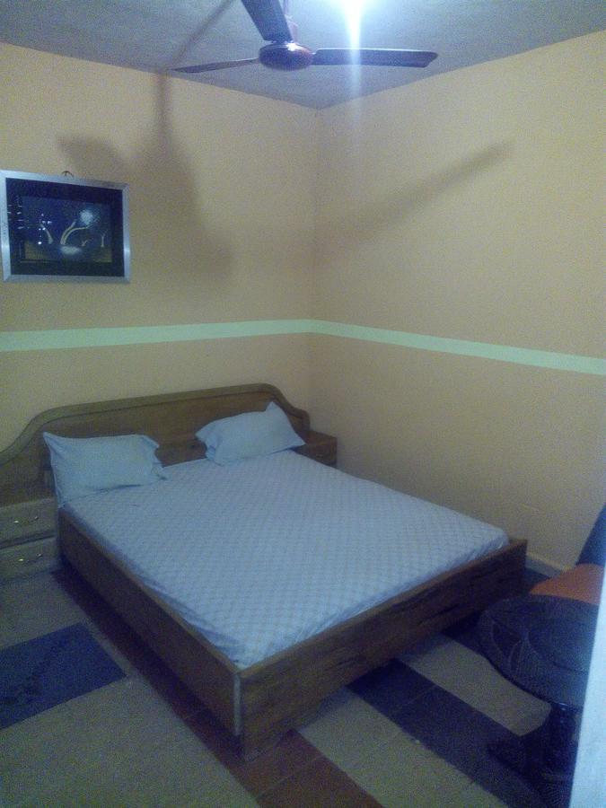 Open Space Hotel Кумаси Екстериор снимка